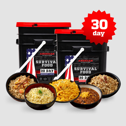 Image of American Reserves 30 Day Emergency Food Supply Bucket 1 & 2 with US flag background, featuring four bowls of rice with vegetables, cheesy pasta, oatmeal, and chili. A red badge emphasizes the 30-day food supply for emergencies.