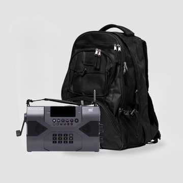 A black backpack with multiple zippered compartments and a Kaito KA900 crank radio, featuring a digital display, buttons, and an antenna with the KAITO brand name, are displayed against a white background in the American Reserves Kaito KA900 Crank Radio & Black Backpack Bundle for emergency preparedness.